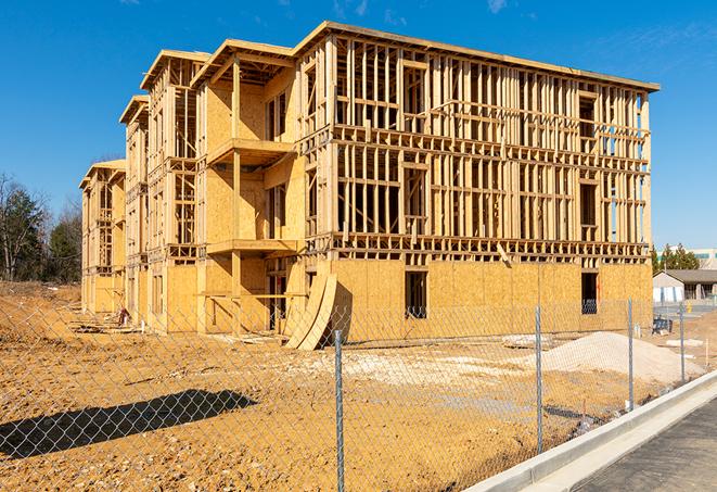 a job site enclosed by temporary chain link fences, ensuring safety for workers and pedestrians in Camarillo CA